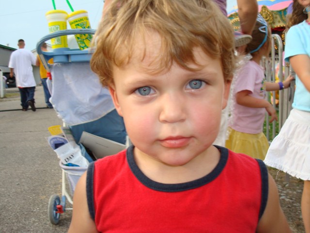 See, he does smile sometimes.  Almost :)