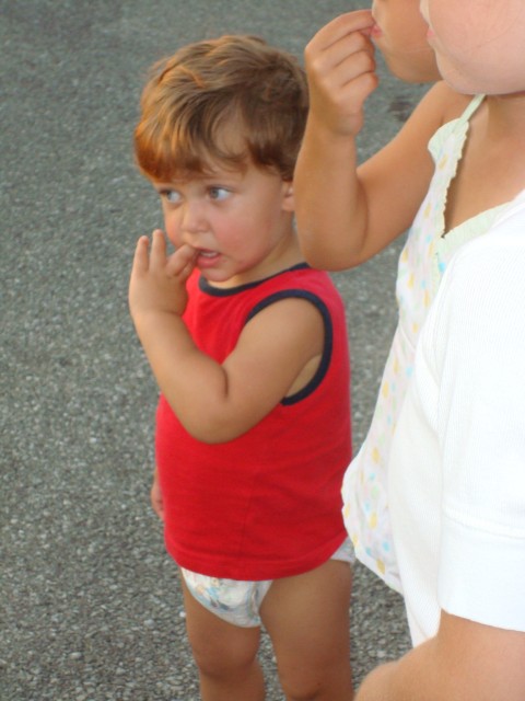 OK.. so .. yeah... I took Isaiah's diaper off.. and he pissed in his shorts.. so he ended up in a just a diaper.  Ya live, ya learn!