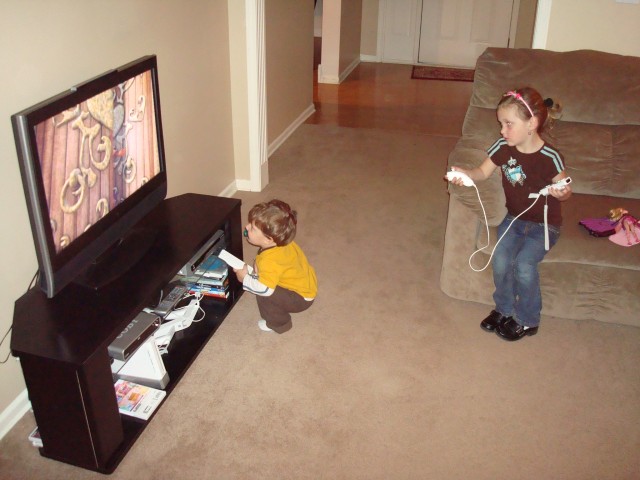 Abby had a blast playing her new Wii game.  Isaiah helped, of course :)