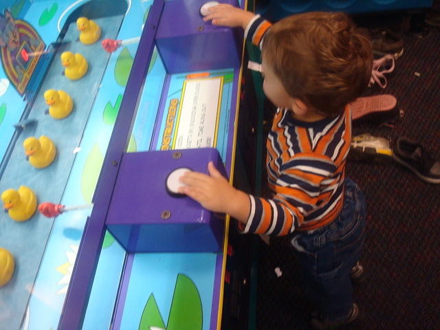 He's double-fistin' it like an old lady sittin' between two slot machines.