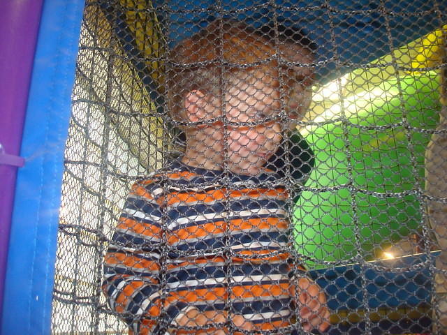 Isaiah finally went into the climby thing, but he wouldn't take his shoes off.