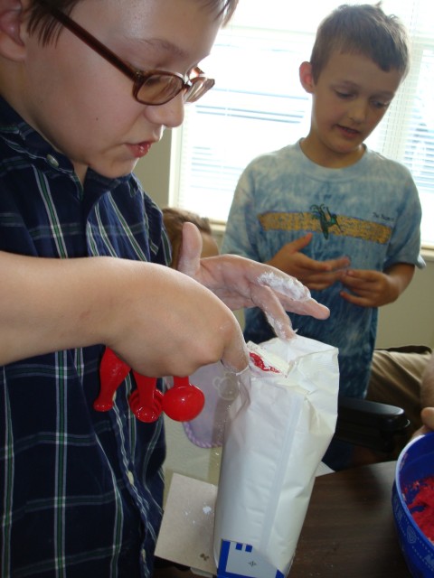 First you add... um... what is that.. Play Dough concentrate?