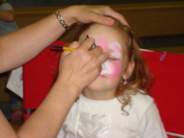 Abby got her face painted at the carnival!