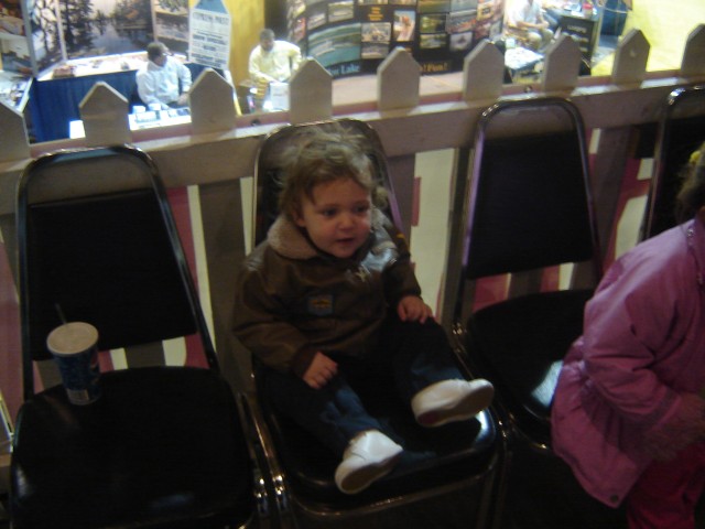 Isaiah can't wait to be old enough to join in the shooting action!  Maybe next year? :)