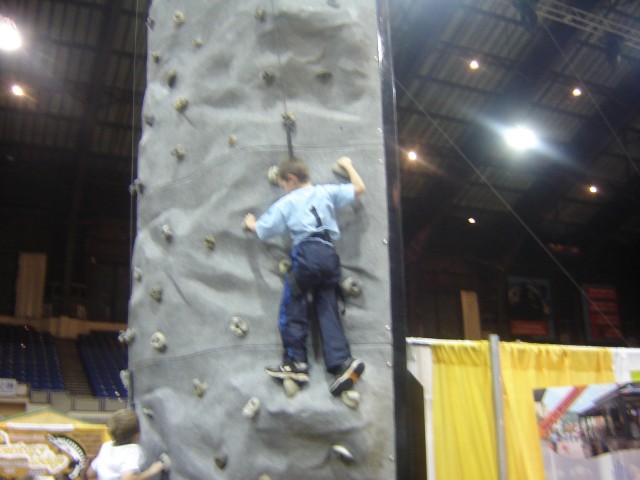 Elijah is climbing the rock wall.. third year?