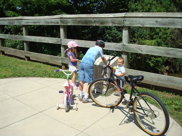 Timmy's readin' the ol' Fishin' Hole plaque.
