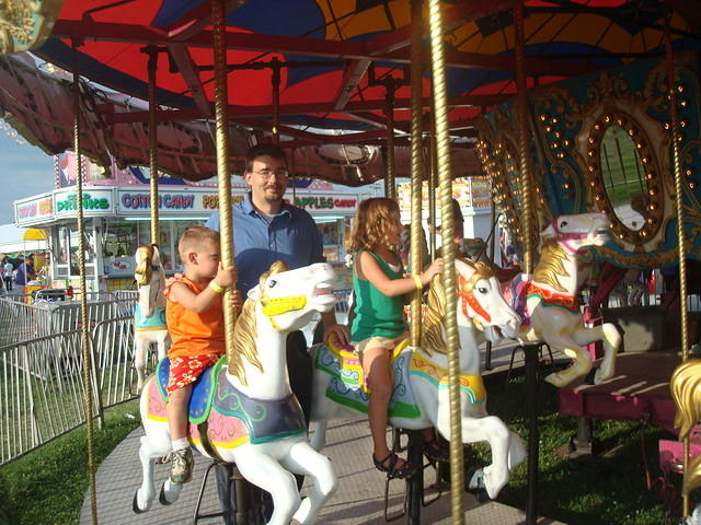 Another year of rides at the fair!  Isaiah is big enough to really partake this year.