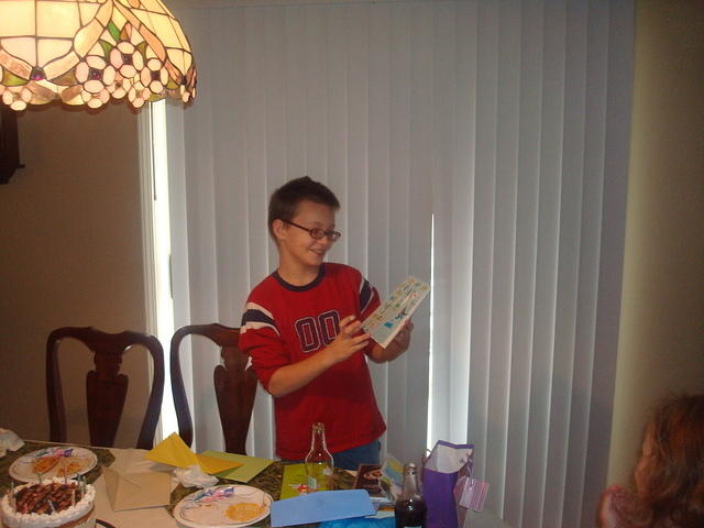 Timmy is the official card reader in the family, and he finally gets to read his own card :)