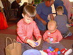 Timothy and Elijah had fun taking all the candy out of the Easter eggs.