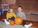 Timothy and Elijah with their finished pumpkins.