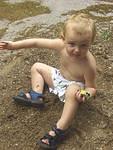 Elijah liked playing in the sand.