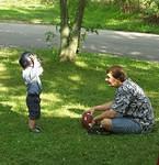 This is how you put the helmet on Daddy...