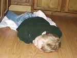 Elijah fell asleep on the floor while I was cooking.