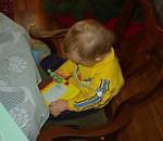 Elijah is writing on his handy dandy notebook :) Elijah really likes Blue and Bob the Builder.