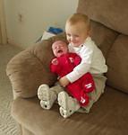 Mary doesn't look to happy at the moment. Elijah really loves his little sister. He calls her 'Mame'.