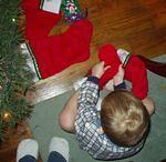 It was Elijah's idea to put the stockings on his feet. He is such a character!!  (see my feet:)