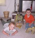 Timothy was proud of his car ramp :)  (of course, Elijah thought he needed in the picture also)