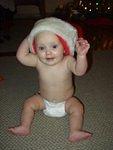 Abigail looks really excited!! That must be Santas hat :)