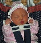 She looks so small in the car seat.