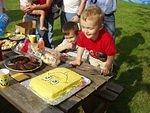 Elijah liked his cake :) and blowing out the candles!