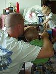 Nicholas is helping his Daddy put a toy together!