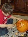 Timothy cleaned out his pumpkin and carved it all by himself :)