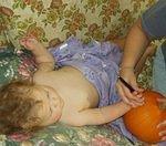 Mary is helping prep her pumpkin!