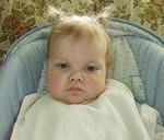 I wish my mother would stop putting my hair up like this!!!