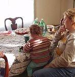 Abigail is sneaking a cupcake with Mamaw!!