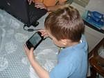 Elijah had fun with Timmy's PSP.