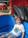 Abby was SO excited to be riding the tilt-a-whirl...