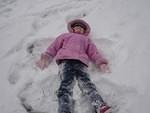 On Sunday, Uncle Jessup took the kids to the park.  Abby made a snow Angel.