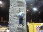 Elijah is climbing the rock wall.. third year?